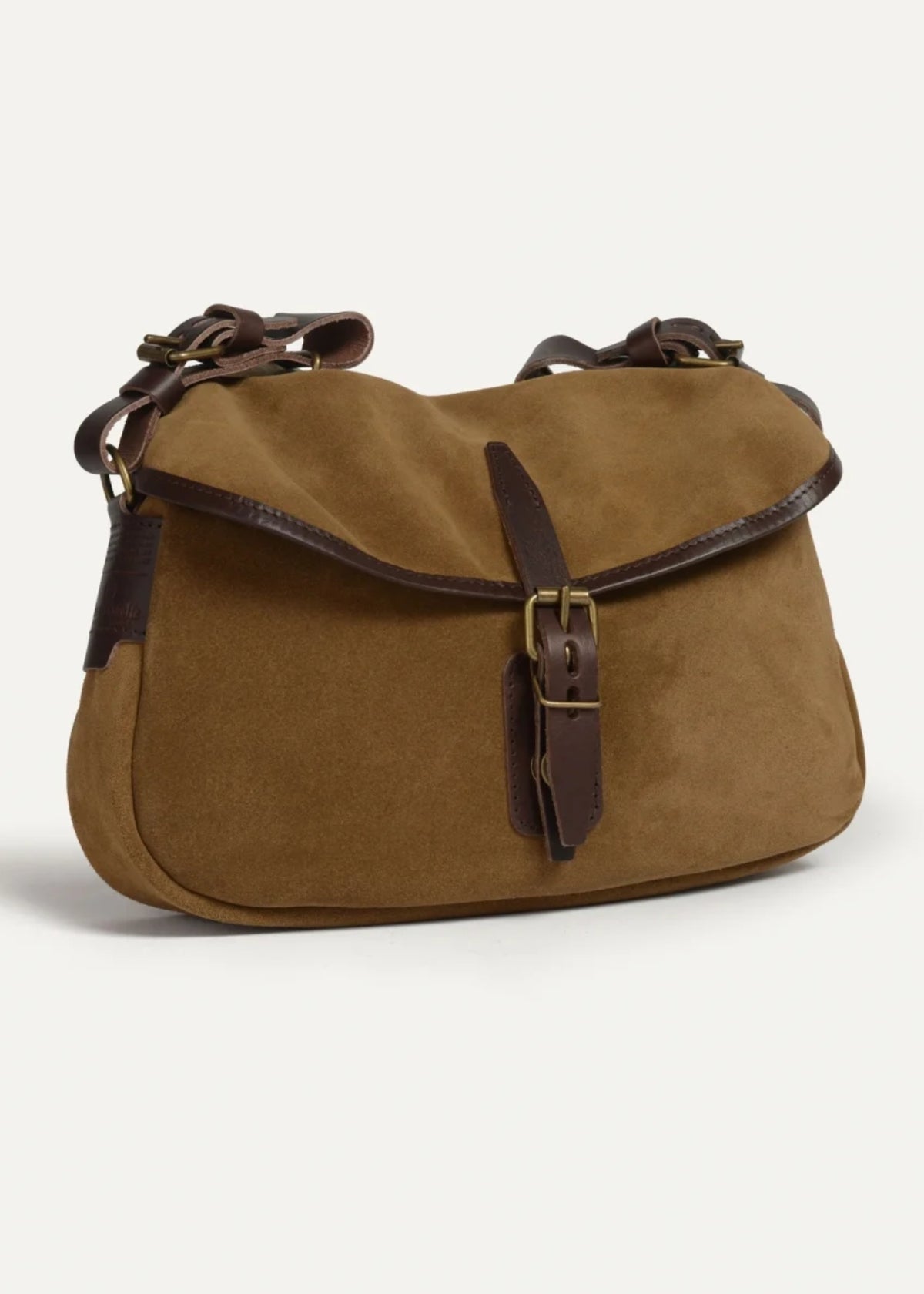 A brown suede shoulder bag with dark brown leather straps and a brass buckle closure, shown against a plain light background.
